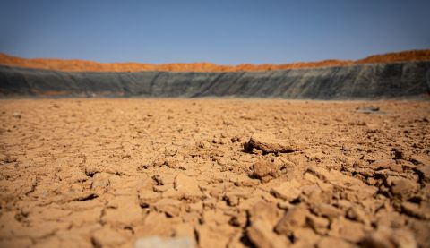 Once filled with over 150,000 barrels of water, this ActionAid-implemented earth dam in Beerato, Somaliland is now completely dry due to failed rains and increasing temperatures