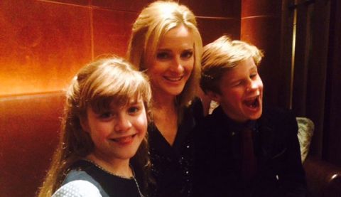 English presenter and sports journalist Gabby Logan with her two children