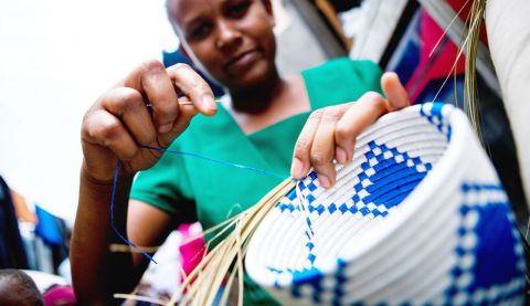 In Uganda Cossy, a survivor of violence, now works as a basket weaver, and does outreach in her community to support other survivors.