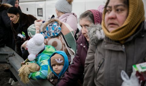 Displaced women and children arriving at Hrebenne, a crossing point on the Polish side of the Ukraine-Poland border where ActionAid and partner Polish Humanitarian Action are working