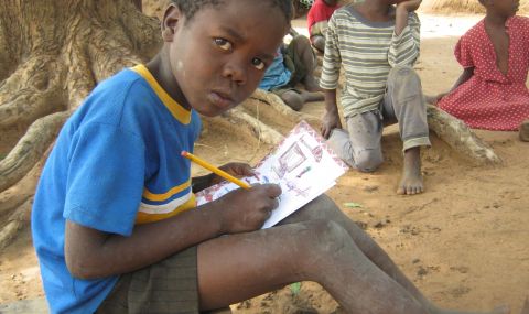 Nine-year-old Clement in Malawi enjoys taking time to write messages and send drawings to his sponsor