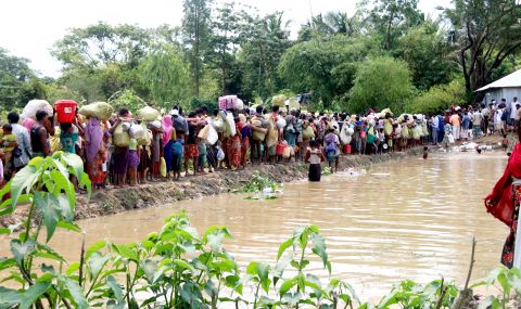Rohingya refugees making their way to displacement camps in Cox's Bazaar in Bangladesh after fleeing from Rakhine, Myanmar.