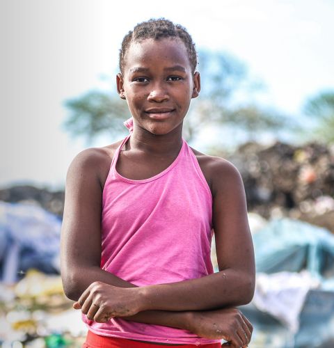 Anisa, 10, lives and works on a dumpsite in Mombasa County, Kenya