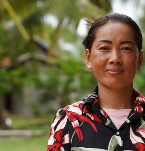 Hok is a Women's Champion in Cambodia, helping her community become more resilient to climate change. Cindy Liu/ActionAid