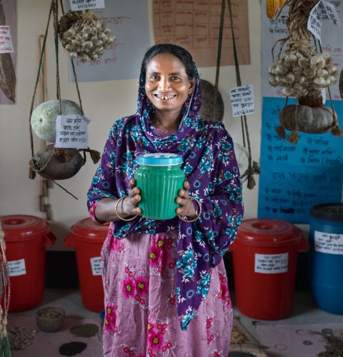 Gulshanara, 45, farmer, grandmother and president of women farmers' group with husband Noab