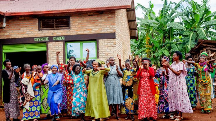 Women farmers in Rwanda celebrating their achievements through the Improving Food Security Project.  Gifts in Wills funds vital projects like these, allowing women to create long term sustainable changes to support their families and communities.
