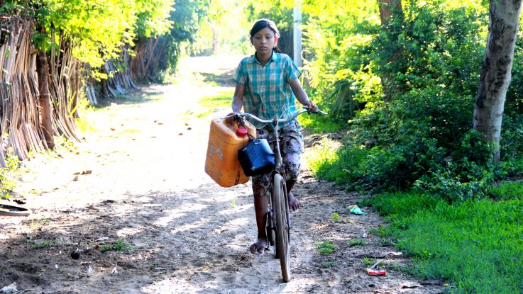 Girls in parts of Myanmar fetch water as part of their household tasks.